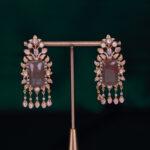 Elegant earrings with gemstones and pearls