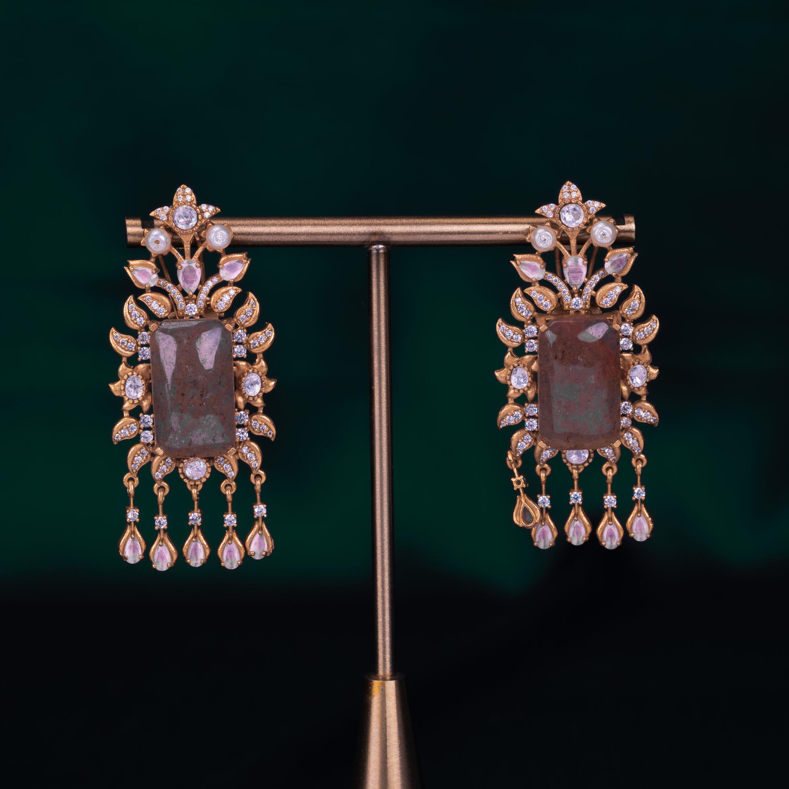 Elegant earrings with gemstones and pearls