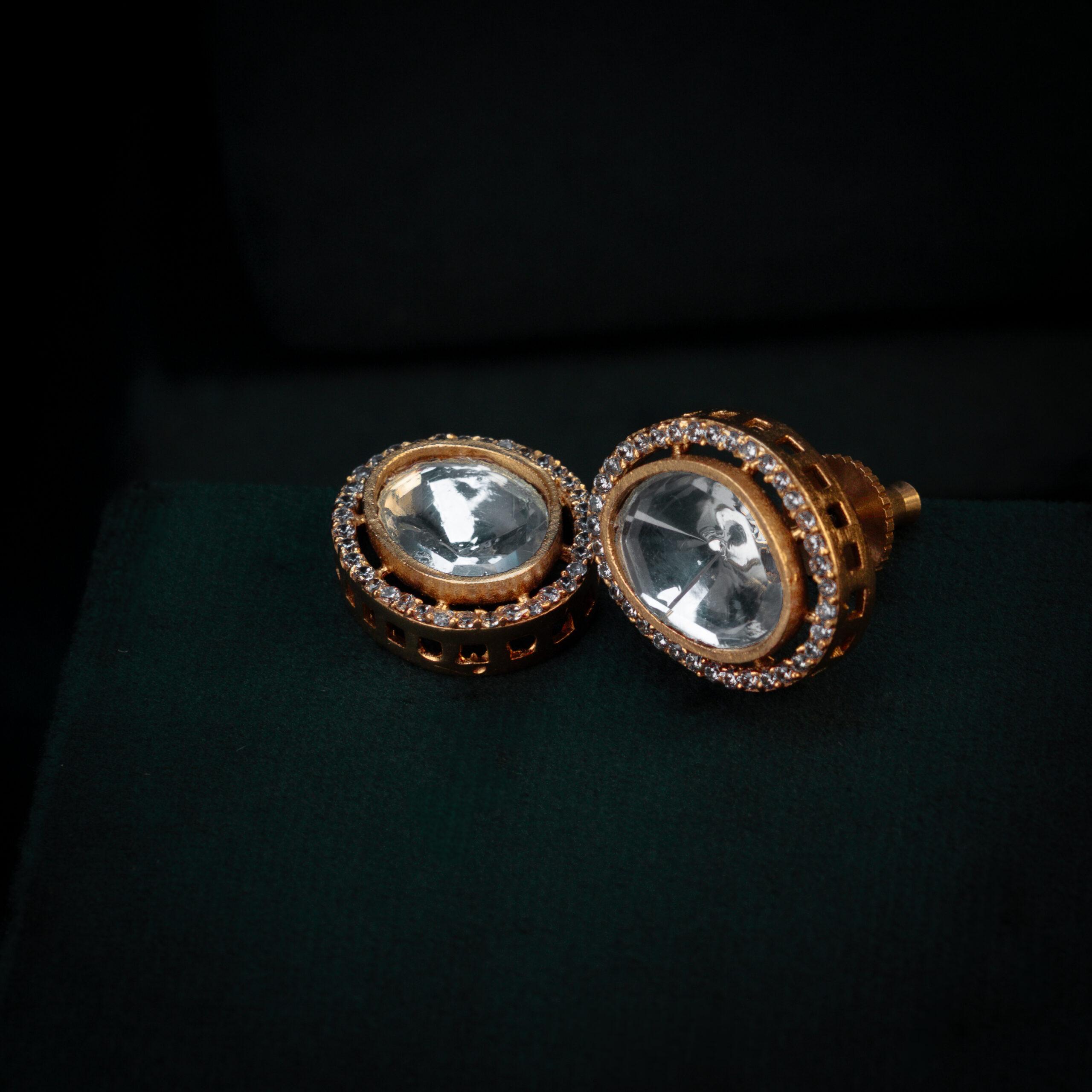 Elegant gold earrings with clear stones