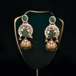 Elegant green gemstone earrings displayed